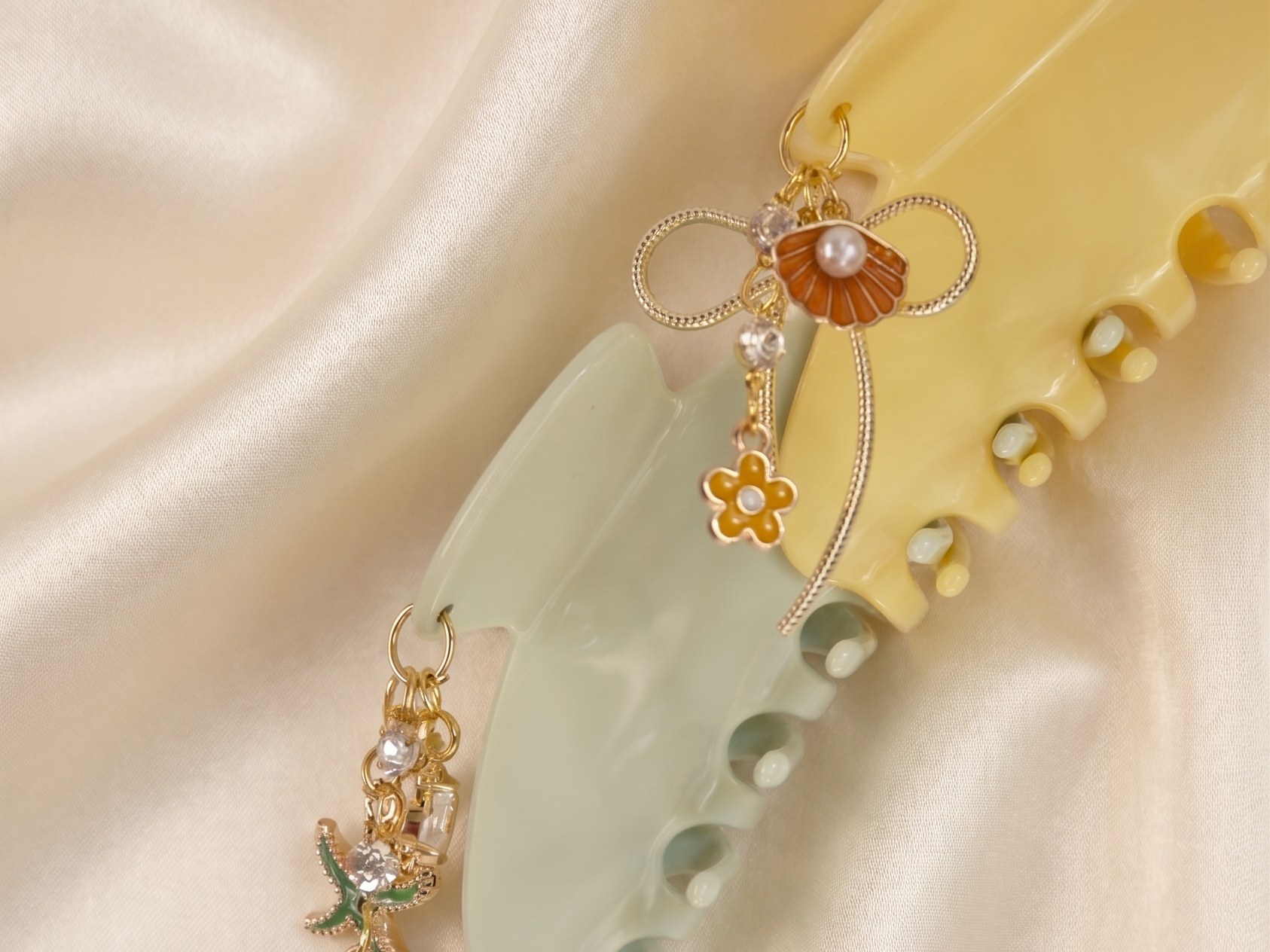 Two Lehr claw clips on cream silk