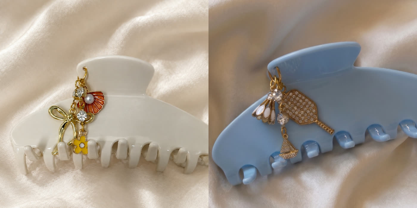 Amsterdam and Queens claw clips side by side on cream silk